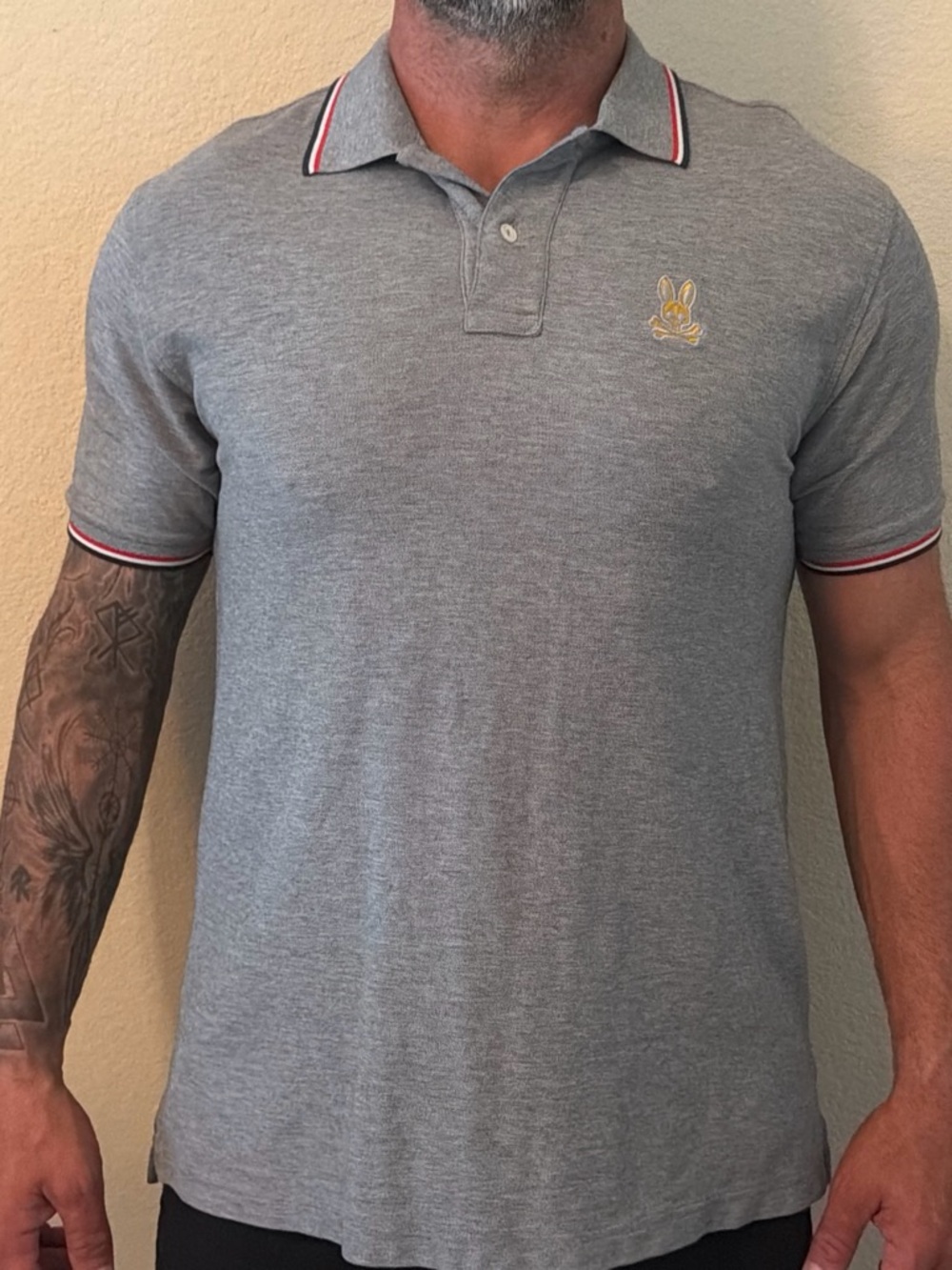 Psycho Bunny Grey Polo with Red-Trim Collar and Gold Bunny Logo